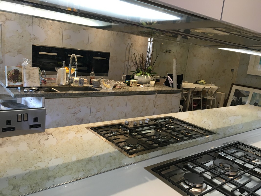 Mirror glass splashback in Streatham Hill luxury kitchen